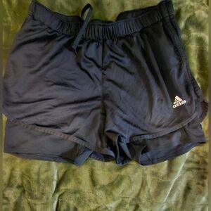 Athletic shorts with inside phone pocket